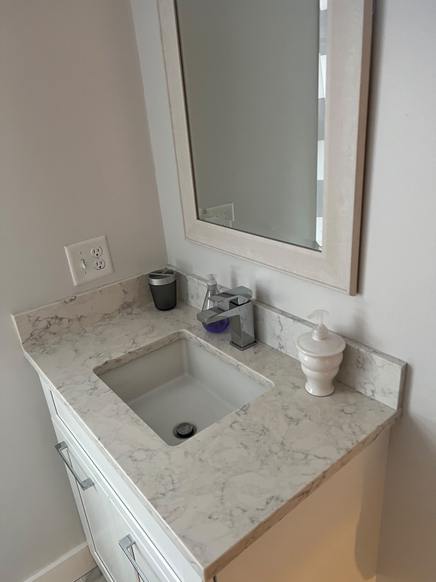 Vanity detail — polished marble & fixtures by MD Cleaning Services LLC